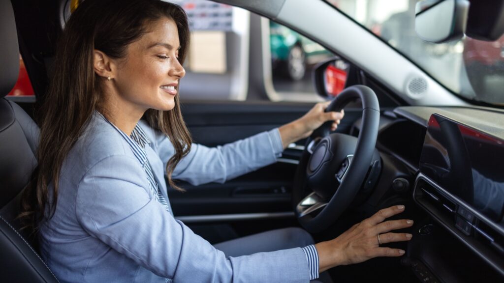 Woman test driving a vehicle